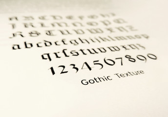 Fototapeta premium old typeface, gothic texture. Book page with calligraphy.