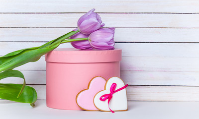 tulip, cookies and present on the table