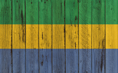 Flag of Gabon painted on brick wall, background texture