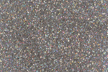 Silver glitter background.  Low contrast photo.