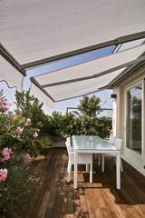 detail of dining table on the terrace