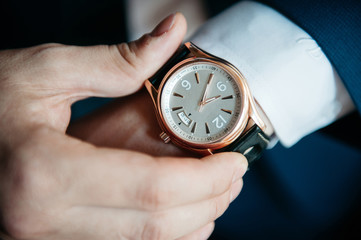 men's watch on his hand close-up