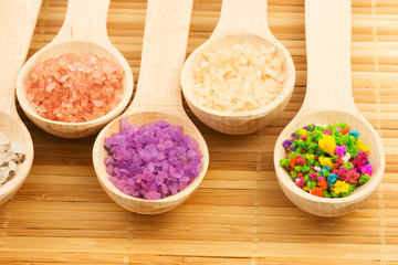 Wooden spoons with colorful sea salt