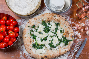 Pizza with mozzarella cheese, ricotta and spinach  with fresh To