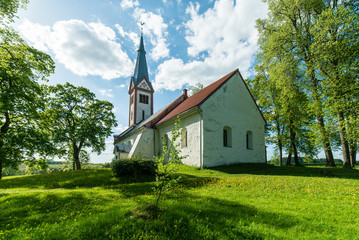 Fototapeta na wymiar countryside church building in summer