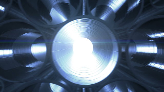 Metal Pipes with blue reflections and flares inside. Looped 3d animation. HD 1080. Steel pipes at metal factory.