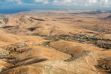 Fototapeta na wymiar Volcanic Lanscape. Panoramic view on Fuerteventura from Mirador Morro Velosa, Fuerteventura, Canary Island, Spain