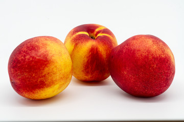 Three Nectarines