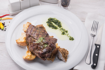 beef steak on white table