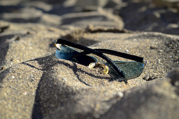 Sunglasses on the sand