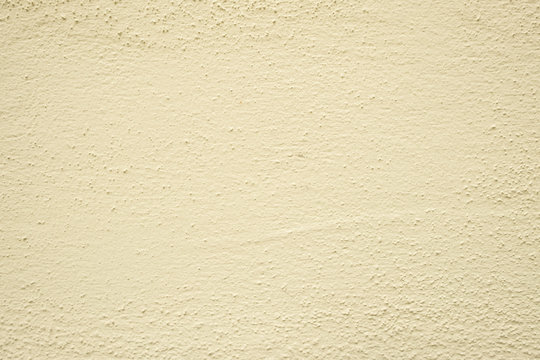 Putz in beige auf einer Wand