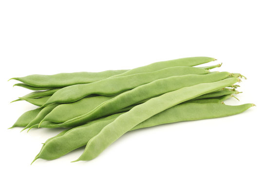 fresh string beans on a white background
