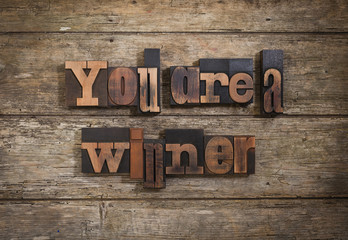 you are a winner, phrase set with vintage letterpress type