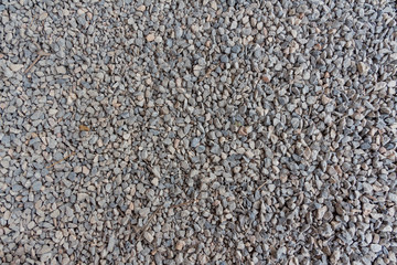 Gravel on street and sidewalk.