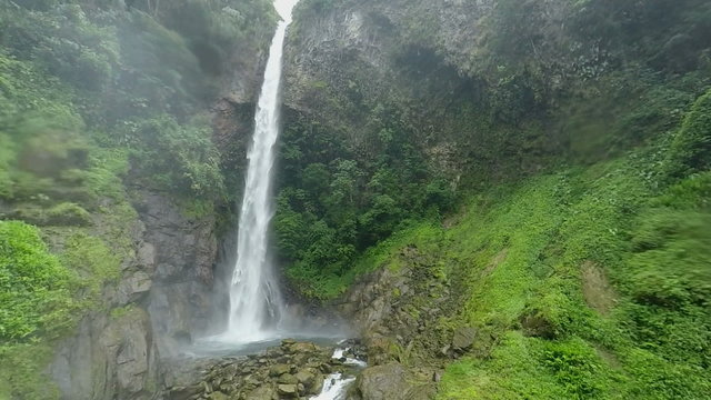 Experience the breathtaking beauty of the Machay Waterfall's upper part in a mesmerizing slow motion 120fps static shot.