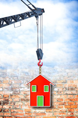 The construction of a prefabricated house - concept image