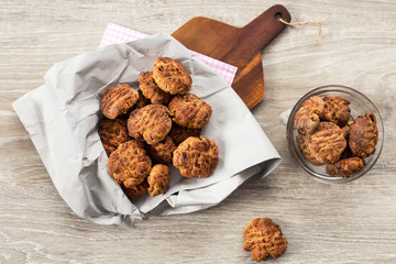 homemade cookies stuffed with dried apricot over wood