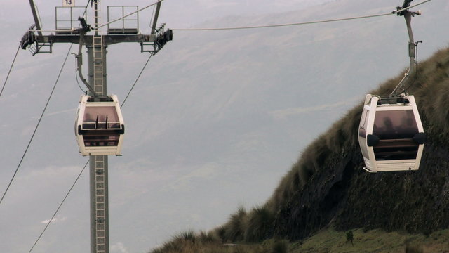 Experience breathtaking views of Quito's Pichincha volcano as you soar through the skies on the city's renowned touristic cable car.