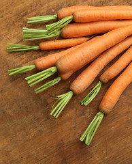 carrots on wooden table.