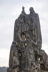 Statue on Charles Bridge (Karluv most, 1357), a famous bridge that crosses Vltava River in Prague, Czech Republic