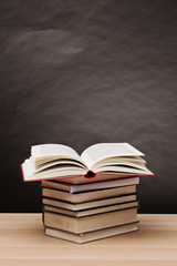 
Open book on table and gray background and copy space
