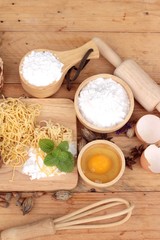 Making noodle with wheat flour and egg for cooking.