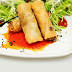 Tasty Rolls on White Plate