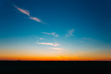Sunset, Sunrise Over Rural Countryside Field. Bright Colourful D