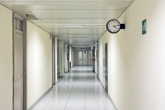 Hospital corridor, with clock