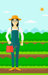 Farmer with watering can.