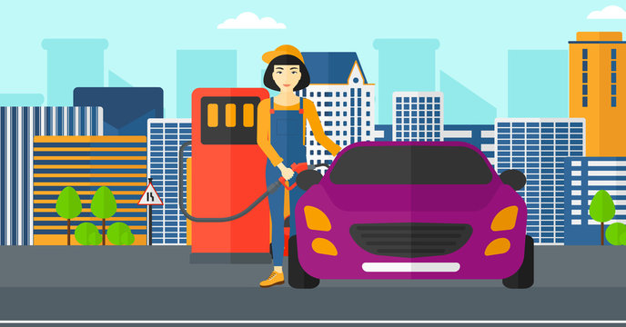 Woman filling up fuel into car.