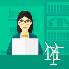 Woman working at laptop. 