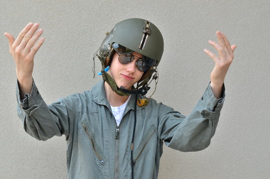 pilot with hands up