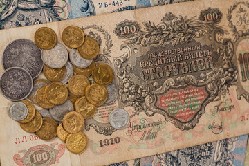 Fototapeta na wymiar Ancient Russian money pocket watch background.Concept Russian an