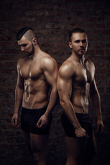 Fototapeta na wymiar Young muscular men