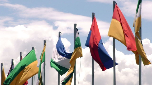 Experience the mesmerizing beauty of Ecuadorian flags gracefully fluttering in high speed winds,captured in stunning slow motion.