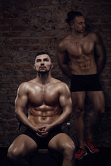 Two young muscular men