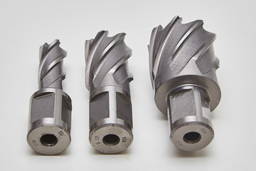 A bunch of heavy duty drill bits on studio white. HSS core drill for metal.