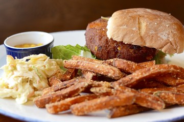 Vegetable burger with sweet potato fries 