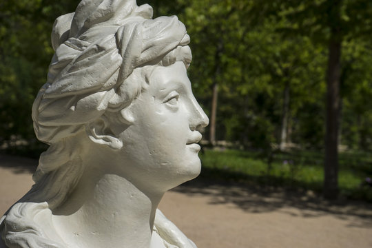 queen, white marble sculptures in the gardens of Segovia, Spain.
