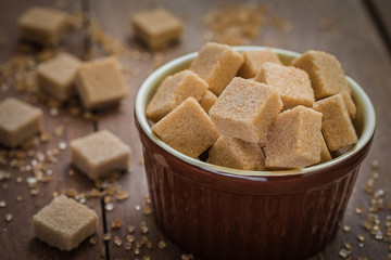 Brown sugar cubes in bowl