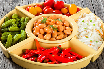 White Beans, pickled cabbage, cherry tomatoes, cucumbers, chili