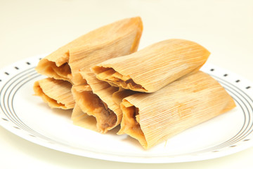 Chicken, cheese and pork tamales