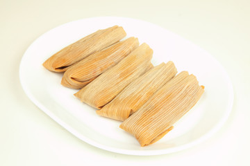 Chicken, cheese and pork tamales