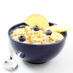 oatmeal porridge in bowl in white background