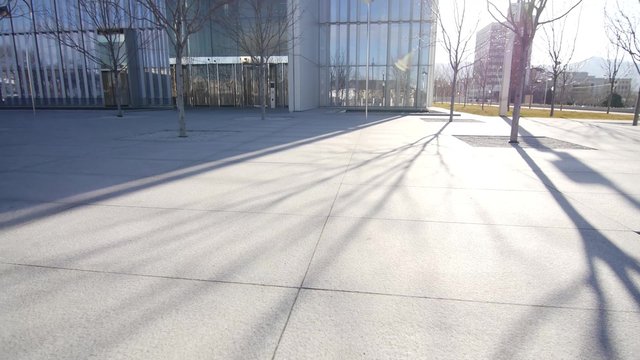 Afternoon shadows are cast in front of the Salt Lake City Federal Courthouse.