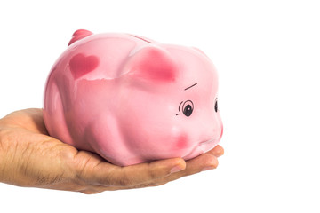 Piggybank in male hand isolated on white