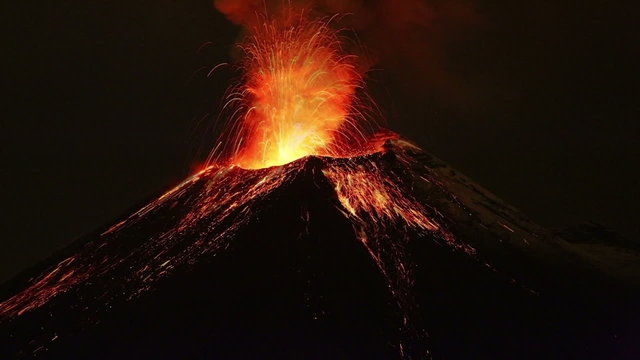 Experience the breathtaking beauty of Tungurahua volcano's eruption at night through our stunning time lapse footage.