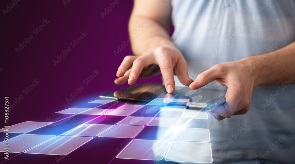 Poster close up of hand holding tablet with cyber application