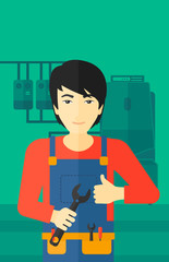 Cheerful repairer with spanner.